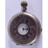 AN ANTIQUE HALF HUNTER SILVER POCKET WATCH. 4.75 cm wide.