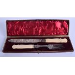 A BOXED SET OF VICTORIAN IVORY AND SILVER PLATED CUTLERY SET.