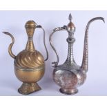 TWO EARLY MIDDLE EASTERN ISLAMIC EWERS. 40 cm & 37 cm high. (2)