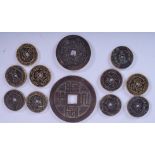 A GROUP OF CHINESE COINS. Largest 7 cm. (qty)