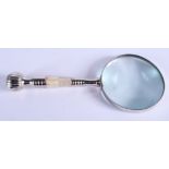 A SILVER PLATED MAGNIFYING GLASS. 24 cm long.