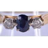 AN 18CT GOLD DIAMOND AND SAPPHIRE RING. 3.3 grams. O.