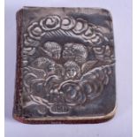 AN ANTIQUE SILVER MOUNTED BOOK. 5 cm x 5 cm.