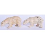 A RARE PAIR OF VINTAGE PAINTED POTTERY ARTIC SNOWY POLAR BEARS. 11 cm x 6 cm.