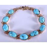 A VINTAGE GOLD AND TURQUOISE BRACELET. 11.4 grams. 16 cm long.