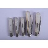 FIVE ANTIQUE MOTHER OF PEARL AND SILVER FRUIT KNIVES. (5)