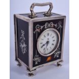 AN ANTIQUE SILVER MOUNTED TORTOISESHELL TRAVELLING CLOCK decorated with classical urns. 9 cm x 6 cm.