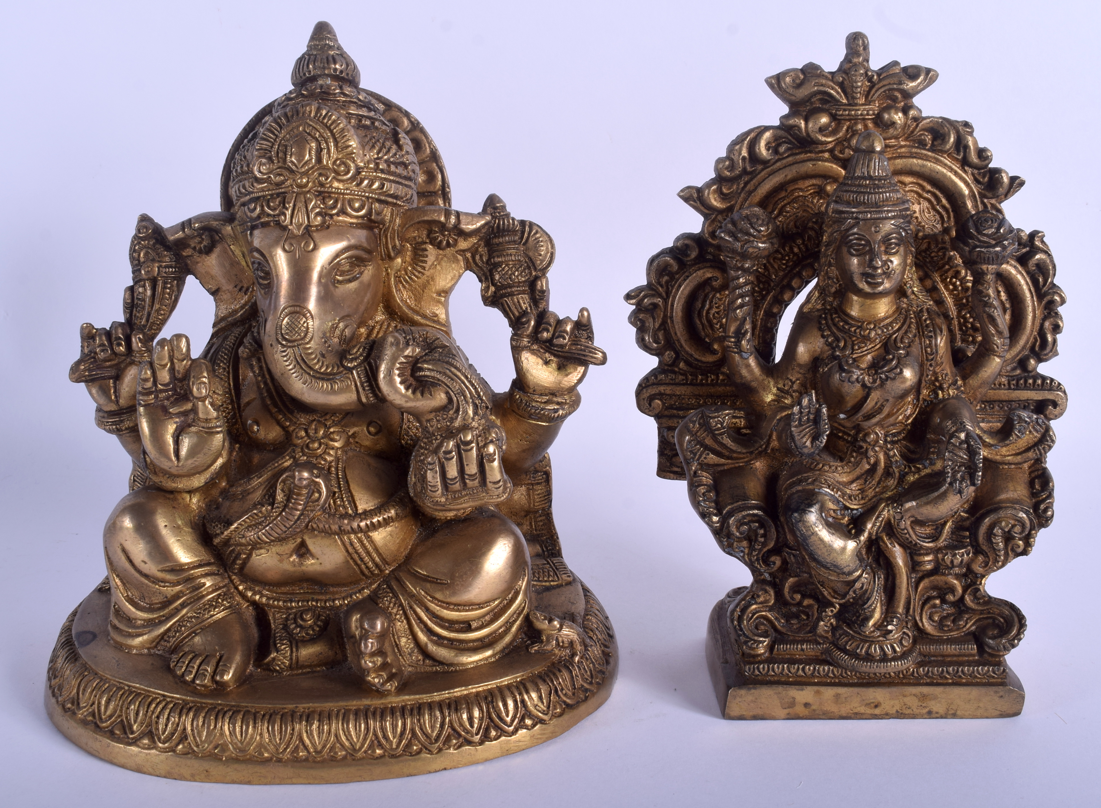 A BRASS STATUE IN THE GFORM OF GANESHA, together with another buddha. Largest 21 cm high. (2)