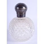 AN ANTIQUE SILVER AND CUT GLASS SCENT BOTTLE. 13 cm high.
