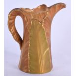 A ROYAL WORCESTER PORCELAIN JUG. 10.5 cm high.