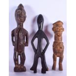 TWO CONGOLESE TRIBAL WOODEN FIGURES, together with another. Largest 38 cm high. (3)