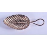 A CONTINENTAL SILVER CADDY SPOON. 7 cm wide.