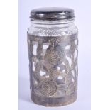 A VINTAGE SILVER OVERLAID JAR. 11 cm high.