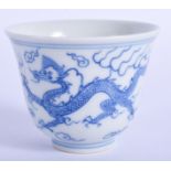 A CHINESE BLUE AND WHITE DRAGON TEABOWL. 5 cm high.