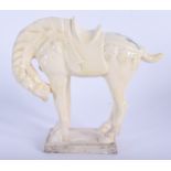 AN EARLY 20TH CENTURY CHINESE PORCELAIN HORSE. 16 cm x 16 cm.