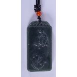 A CHINESE CARVED SPINACH JADE PENDANT TABLET NECKLACE. 3 cm x 6.5 cm.