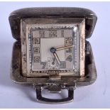 AN ART DECO SILVER PURSE WATCH. 3.25 cm square.