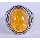 A SILVER AND AMBER RING. W.