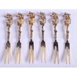 SIX SILVER GILT FORKS. (6)