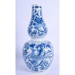 A CHINESE BLUE AND WHITE DOUBLE GOURD VASE painted with phoenix birds. 26 cm high.