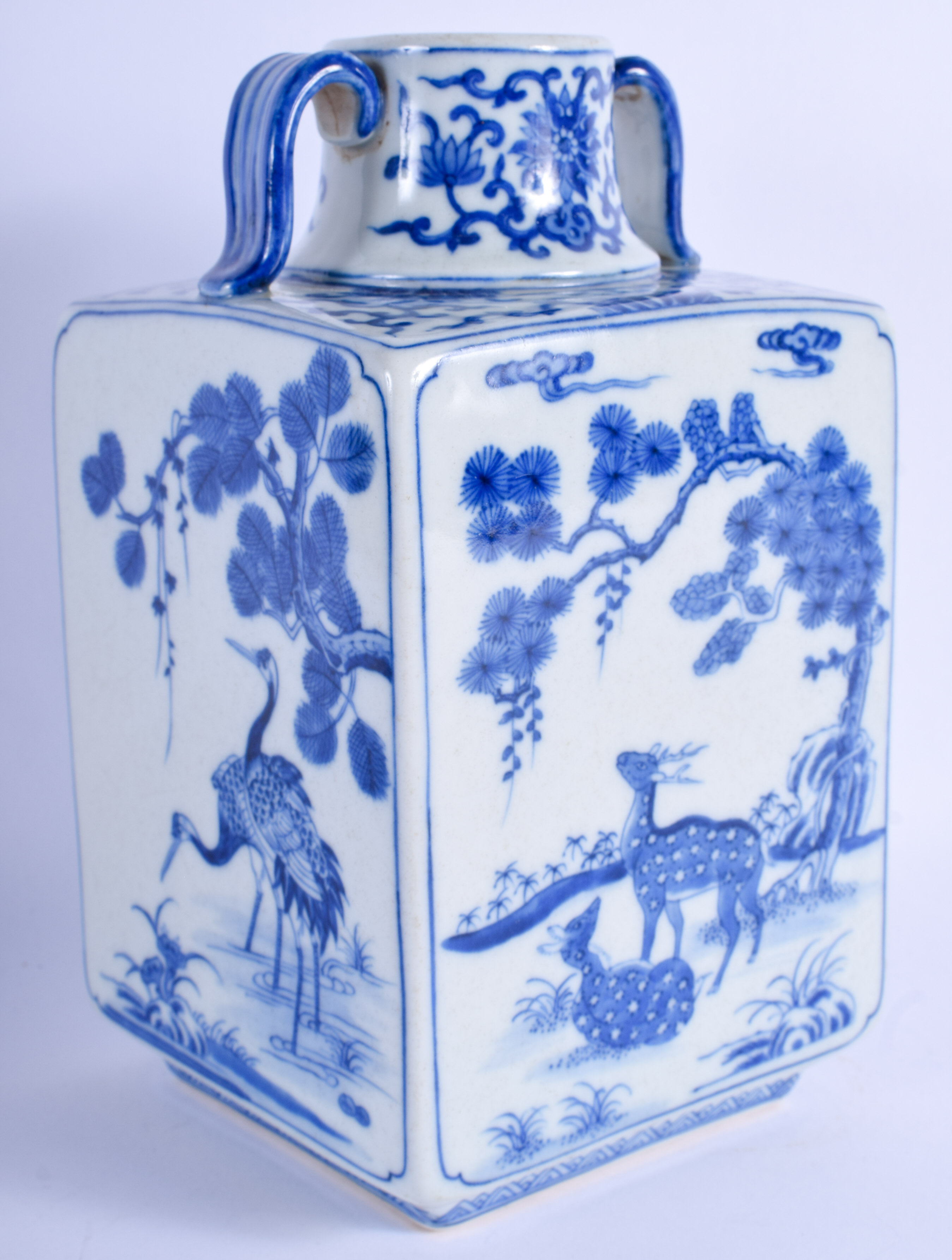A CHINESE TWIN HANDLED PORCELAIN VASE painted with spotted deer. 23 cm x 11 cm.