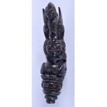 A 19TH CENTURY CONTINENTAL CARVED RHINOCEROS HORN KRISS DAGGER HANDLE of naturalistic form. 15 cm x