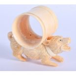 A NOVELTY BONE RING. 8 cm wide.