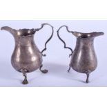 TWO ANTIQUE SILVER CREAM JUGS. 4 oz. 9 cm & 7 cm high. (2)