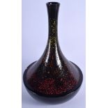 A STYLISH SCANDANAVIAN PORCELAIN VASE, black ground with a “molten” body, 32 cm high.