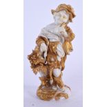A ROYAL WORCESTER TYPE PORCELAIN FIGURINE OF A YOUNG BOY. 12 cm high.