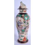 AN EARLY 20TH CENTURY CHINESE FAMILLE ROSE PORCELAIN VASE AND COVER, decorated with figures in battl