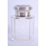 AN ANTIQUE SILVER TOPPED GLASS SCENT BOTTLE. 14.5 cm high.