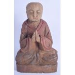 A CHINESE POLYCHROMED WOOD BUDDHA. 26 cm x 15 cm.