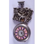 AN ANTIQUE SILVER AND ENAMEL FOB WATCH. 3 cm wide.