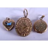 THREE ANTIQUE YELLOW METAL LOCKETS. 14 grams. (3)