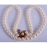 A 9CT GOLD AND PEARL NECKLACE. 44 cm long.