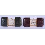 TWO VINTAGE TRAVELLING WATCHES. 7.5 cm wide extended. (2)