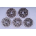 FIVE CHINESE WHITE METAL COINS. 3.1 cm wide. (5)
