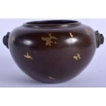 A CHINESE GOLD SPLASH BRONZE CENSER. 14 cm wide.