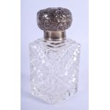 AN ANTIQUE SILVER TOPPED SCENT BOTTLE. 13 cm high.