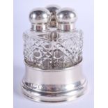 A 1920S SILVER AND GLASS SCENT BOTTLE HOLDER. Birmigham 1920. 5.5 cm wide.