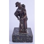 AN ANTIQUE BRONZE FIGURE OF AN ELDERLEY FEMALE modelled upon a square base. 17 cm high.