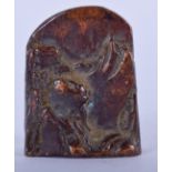 A CHINESE BRONZE SEAL, decorated in relief with a mountainous landscape. 4.5 cm x 3.5 cm.