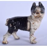 A CAST IRON FIGURE OF A STANDING DOG. 13 cm x 12 cm.