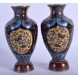 A PAIR OF JAPANESE MEIJI PERIOD CLOISONNE ENAMEL BALUSTER VASE, decorated with foliage. 17.5 cm high