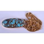 A GOLD AND TURQUOISE PENDANT. 13.2 grams overall. Pendant 3.5 cm x 1.5 cm.