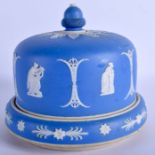 A WEDGWOOD JASPERWARE CHEESE DOME, decorated with neo classical figures. 20 cm x 20.5 cm.