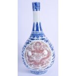 A CHINESE BLUE AND WHITE PORCELAIN DRAGON VASE bearing Qianlong marks to base. 26 cm high.