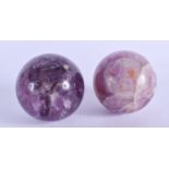 TWO CARVED BLUEJOHN STYLE ORBS. 5 cm wide.