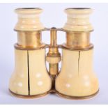 A LARGE PAIR OF MID 19TH CENTURY FRENCH CARVED IVORY BINOCULARS. 12 cm x 12 cm.